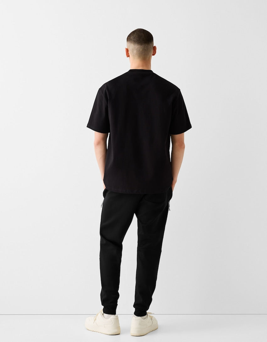 Bershka Plush jogger trousers with seams