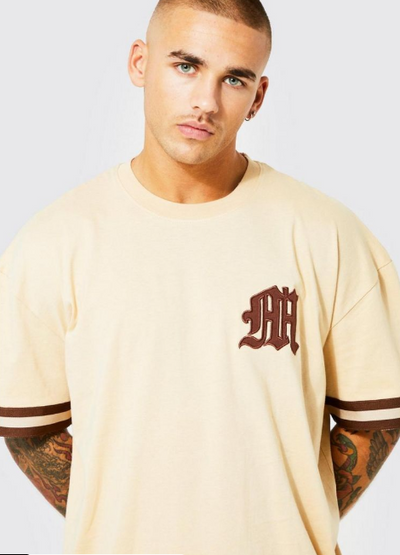 OVERSIZED VARSITY APPLIQUE GRAPHIC T-SHIRT - SAND